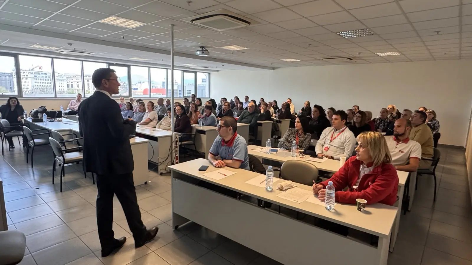 Nikos Sliousaregko leading an interactive professional training session