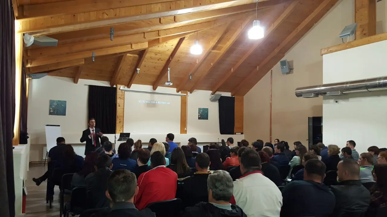 Nikos Sliousaregko presenting to a large training audience